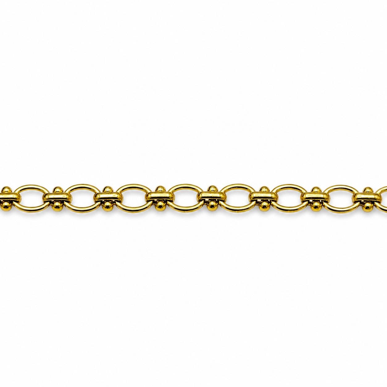 Close up of gold stainless steel link chain with polished finish.