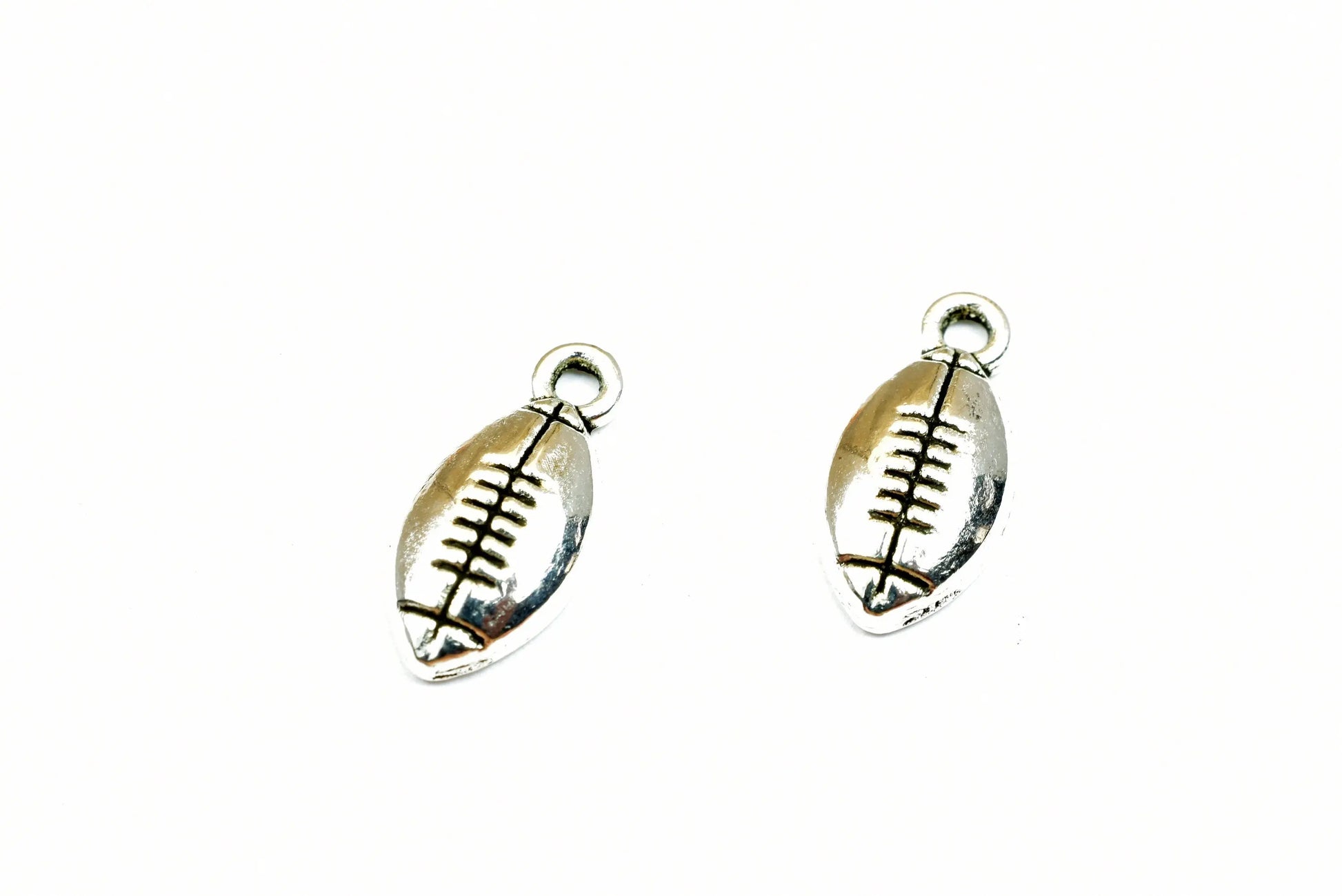 American Football Sport Charms Size 15x7mm Silver Color Charm Pendant Finding For Jewelry Making 32PCs Per Pack - BeadsFindingDepot