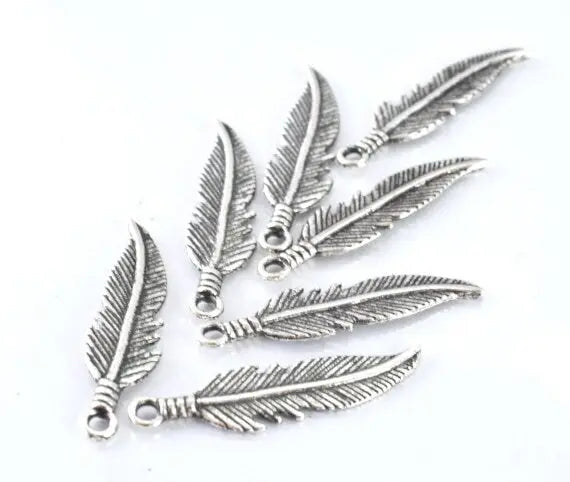 26x7mm Alloy Antique Silver Tropical Textured Leaf Pendant w/black accent detail 20pcs/PK  2mm bail opening - BeadsFindingDepot