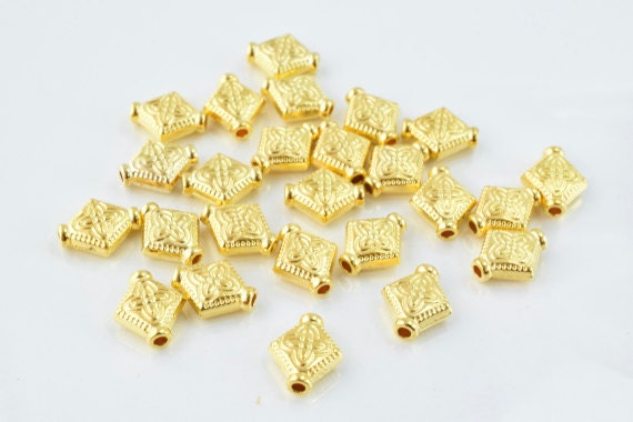 10x9mm Gold Textured Beads, Sold by 1 pack of  25pcs, Double sided hole opening, 1mm, 3mm thickness of bead jewelry making...