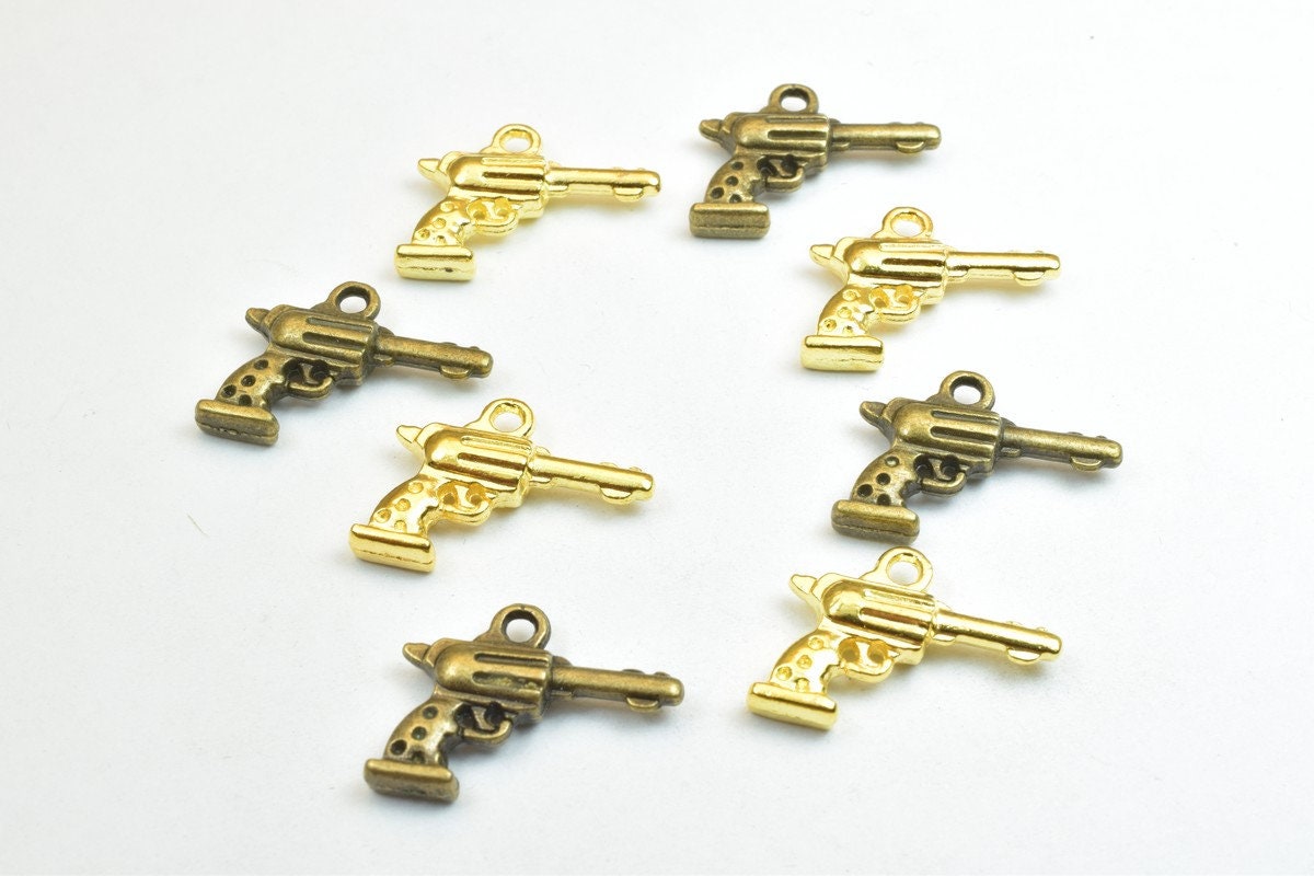 14 PCs Hand Gun Weapons Charm Pendant Antique Green/Gold Beads Base Metal Alloy Pendant Size 20x15mm Jump Ring Size 1.5mm...