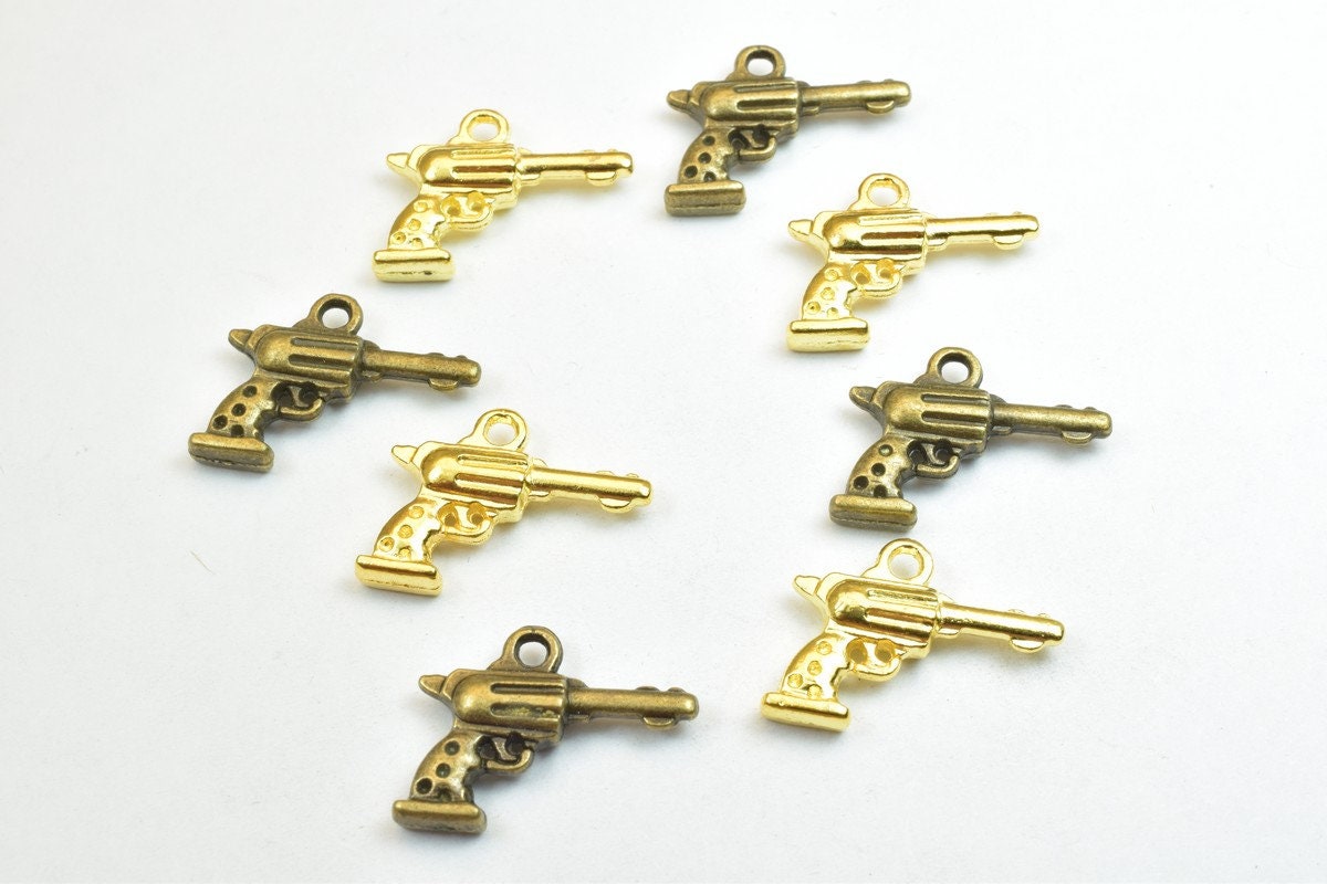 14 PCs Hand Gun Weapons Charm Pendant Antique Green/Gold Beads Base Metal Alloy Pendant Size 20x15mm Jump Ring Size 1.5mm...