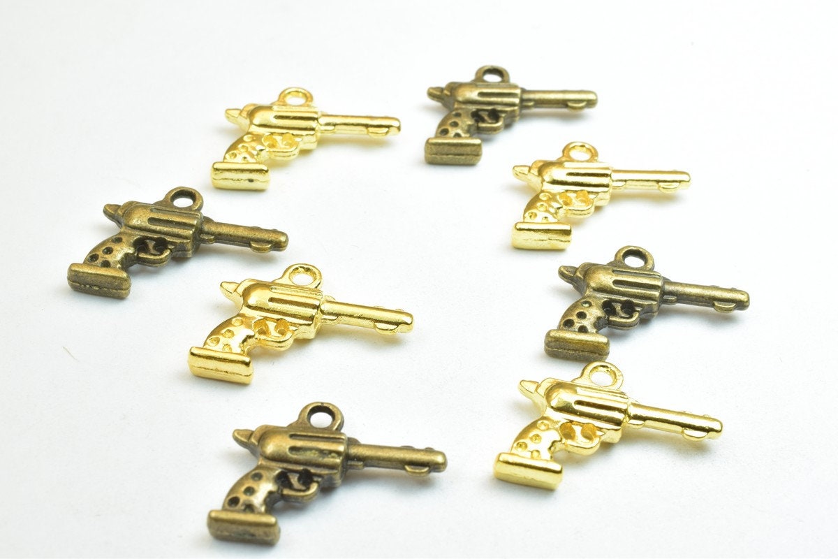 14 PCs Hand Gun Weapons Charm Pendant Antique Green/Gold Beads Base Metal Alloy Pendant Size 20x15mm Jump Ring Size 1.5mm...