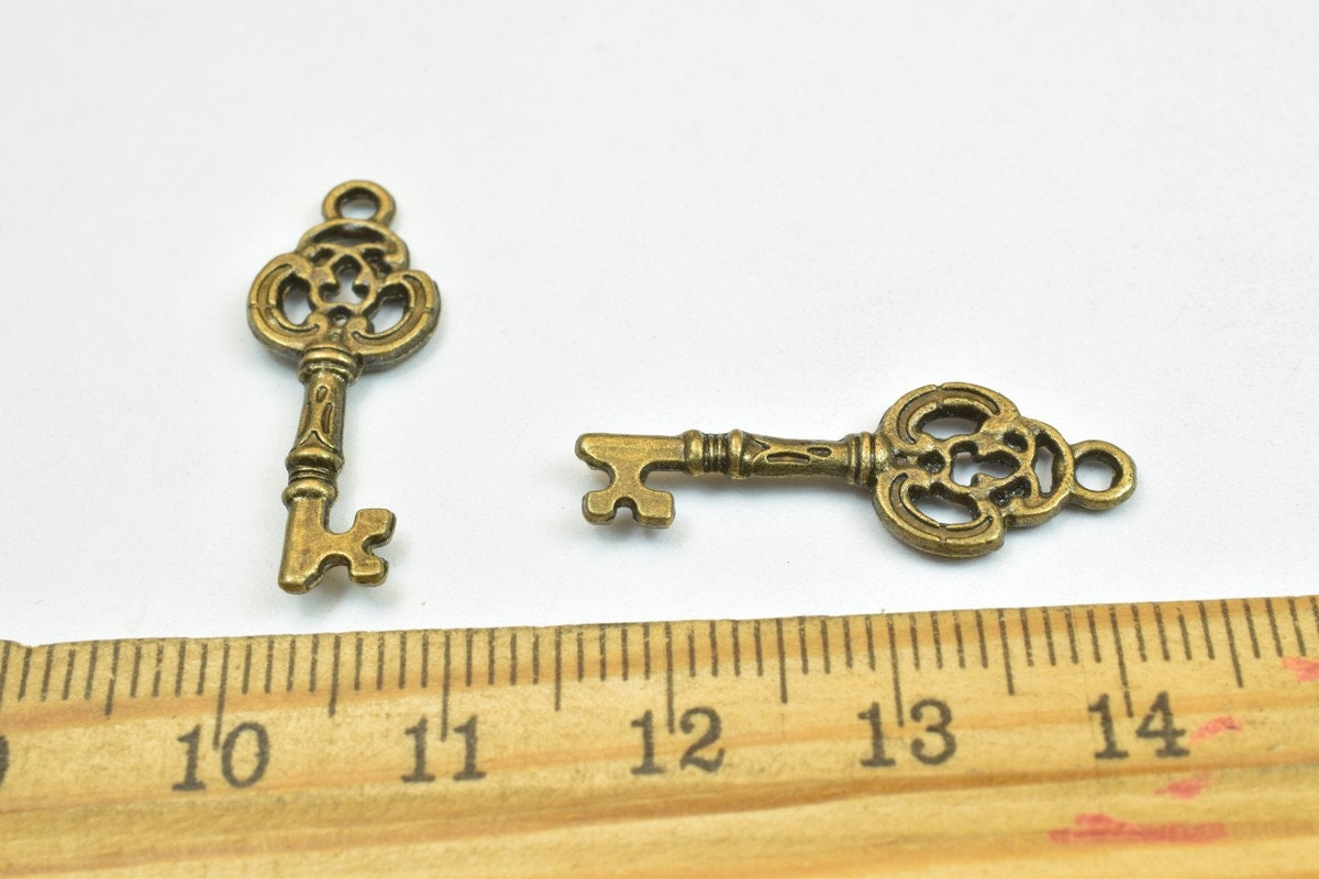 16 PCs Key Charm Antique Green Charm Beads Alloy Metal Bracelets Pendant Size 27x10mm Jump Ring Size 2mm For Jewelry Makin...