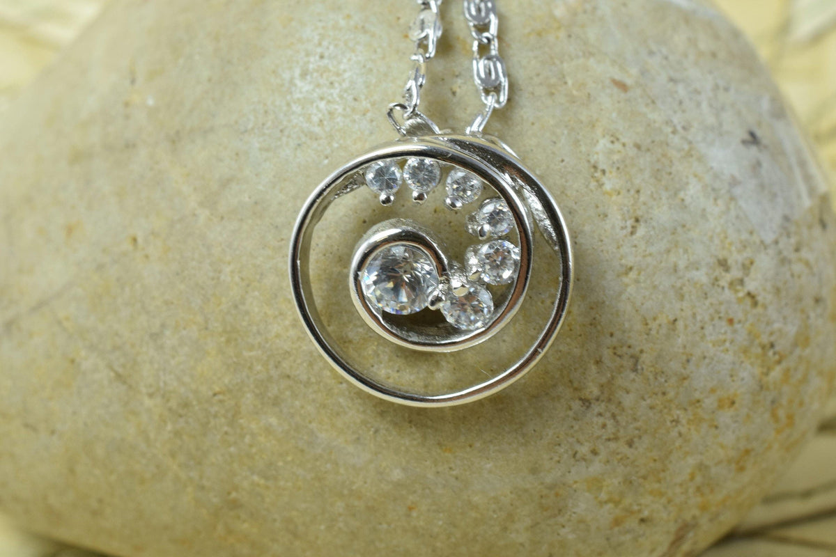 Spiral swirl white gold rhodium plated pendant cubic zirconia pink/clear