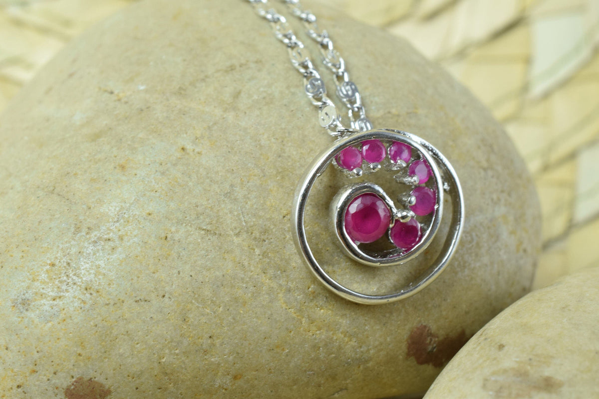 Spiral swirl white gold rhodium plated pendant cubic zirconia pink/clear