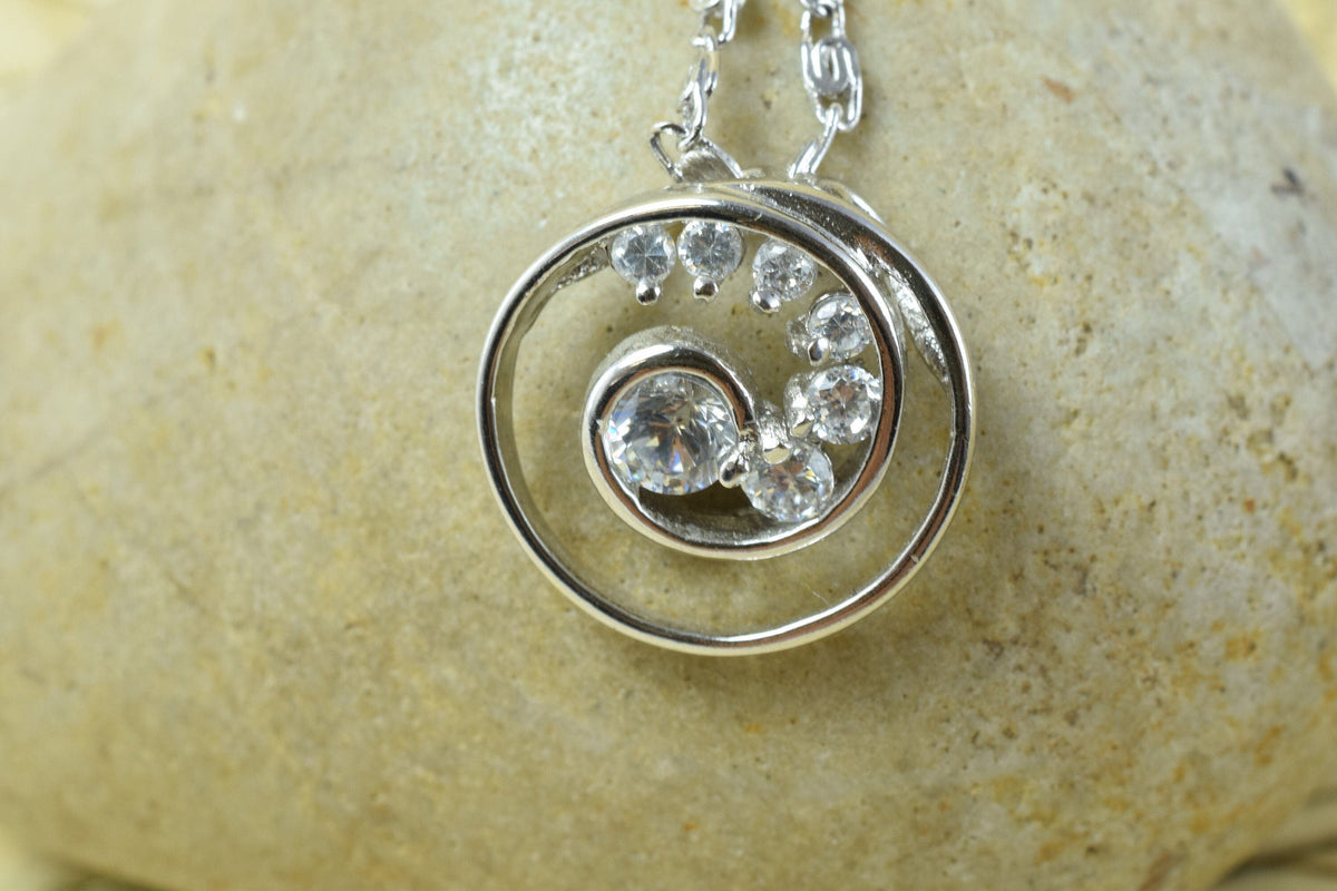 Spiral swirl white gold rhodium plated pendant cubic zirconia pink/clear