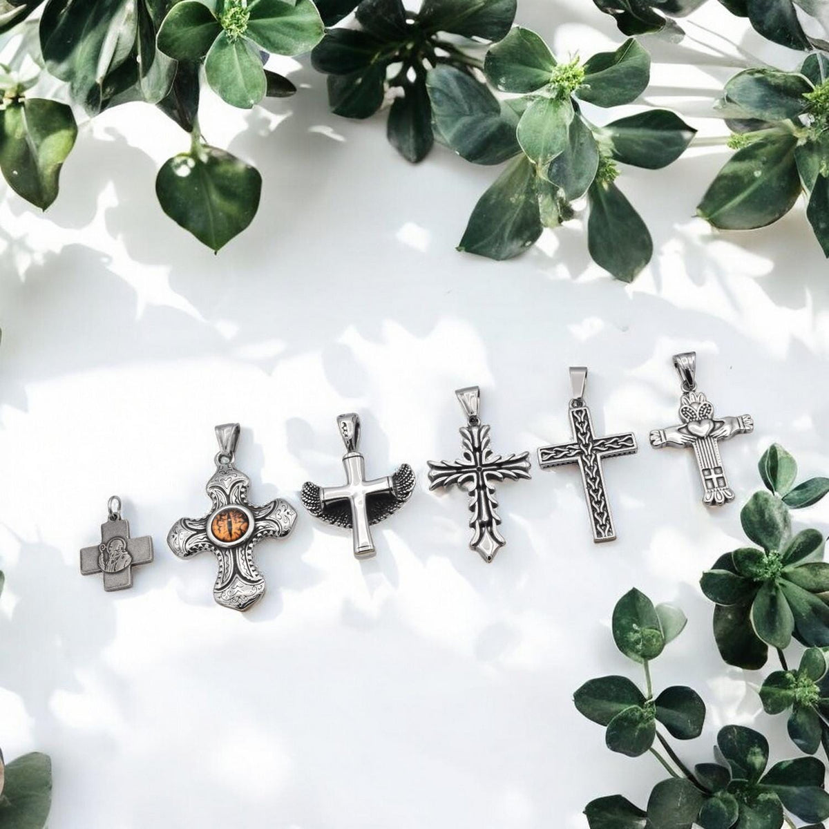Stainless Steel Cross Pendants for necklaces, jewelry making, and crafts reptile eye cross, wing cross, heart cross, etc....