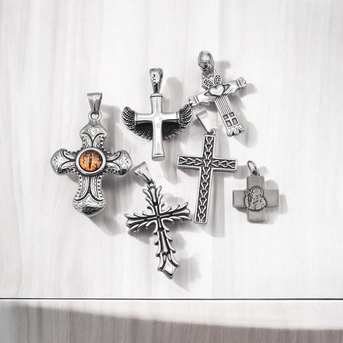 Stainless Steel Cross Pendants for necklaces, jewelry making, and crafts reptile eye cross, wing cross, heart cross, etc....