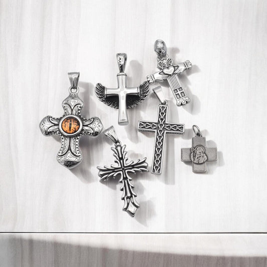 Stainless Steel Cross Pendants for necklaces, jewelry making, and crafts reptile eye cross, wing cross, heart cross, etc....