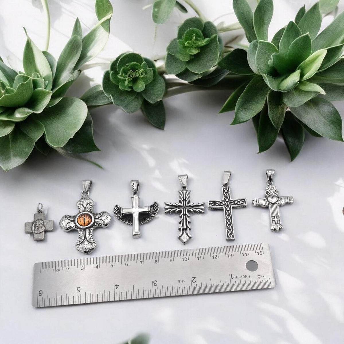 Stainless Steel Cross Pendants for necklaces, jewelry making, and crafts reptile eye cross, wing cross, heart cross, etc....