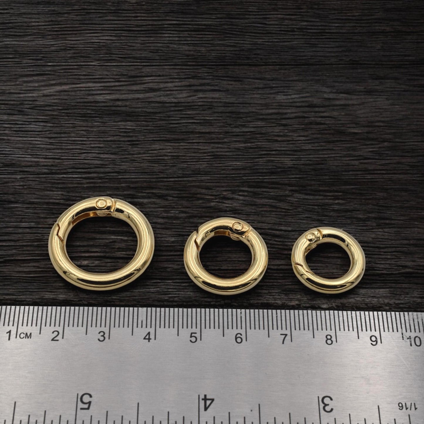 swivel round spring clasp black background