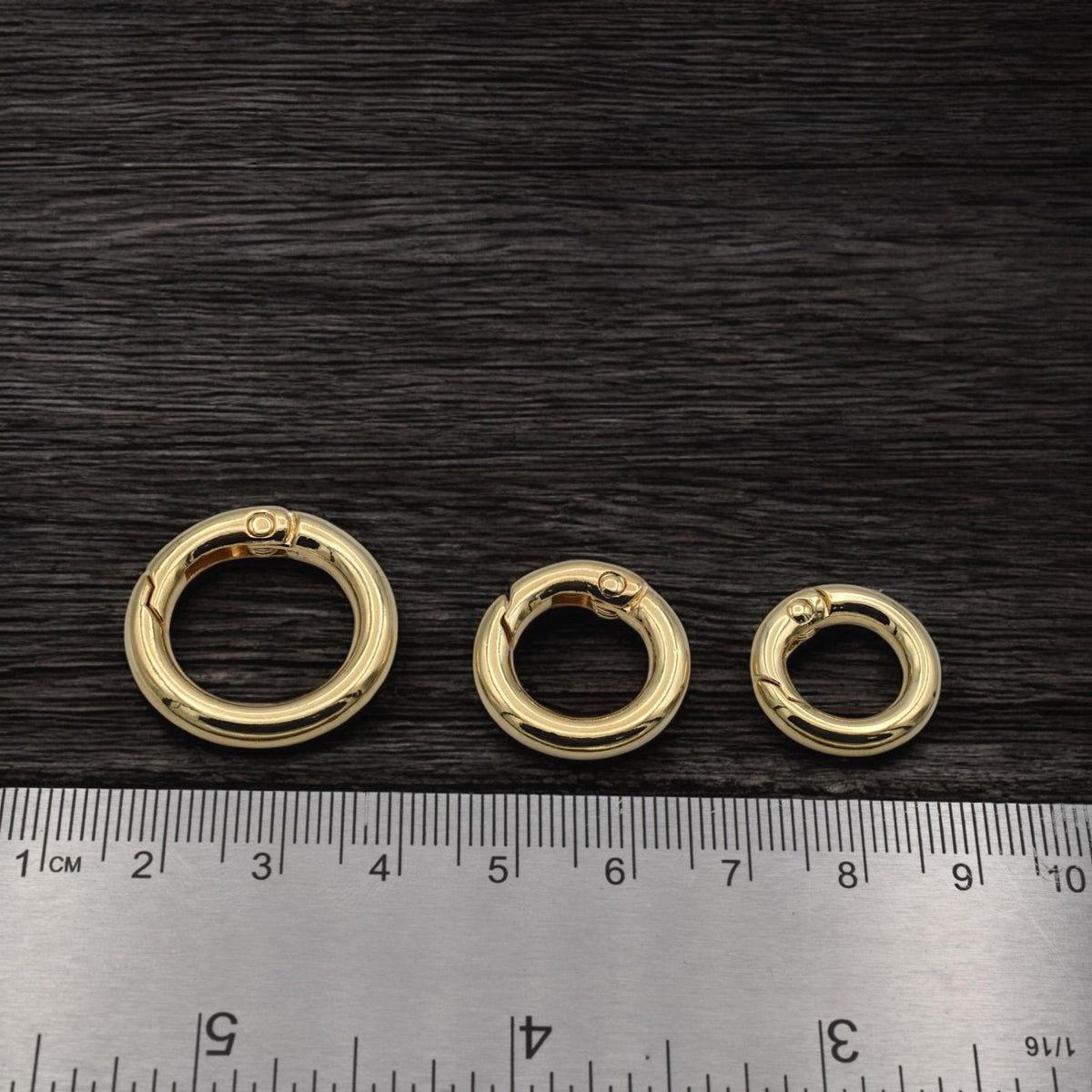 swivel round spring clasp black background