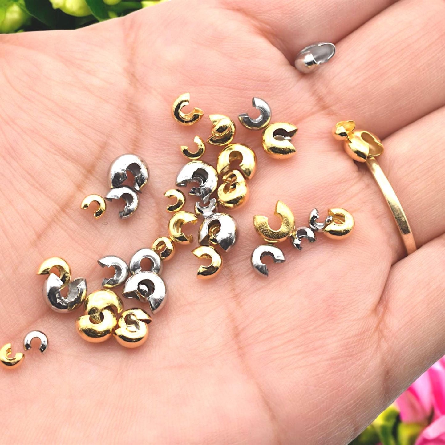 Flat lay of crimp covers in gold tone with product tags, perfect for DIY jewelry supply listings.