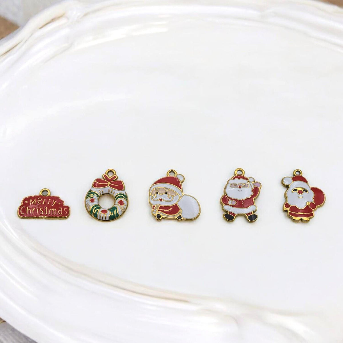 Stainless steel enamel Christmas charms, Santa and wreath pendants for holiday crafts.