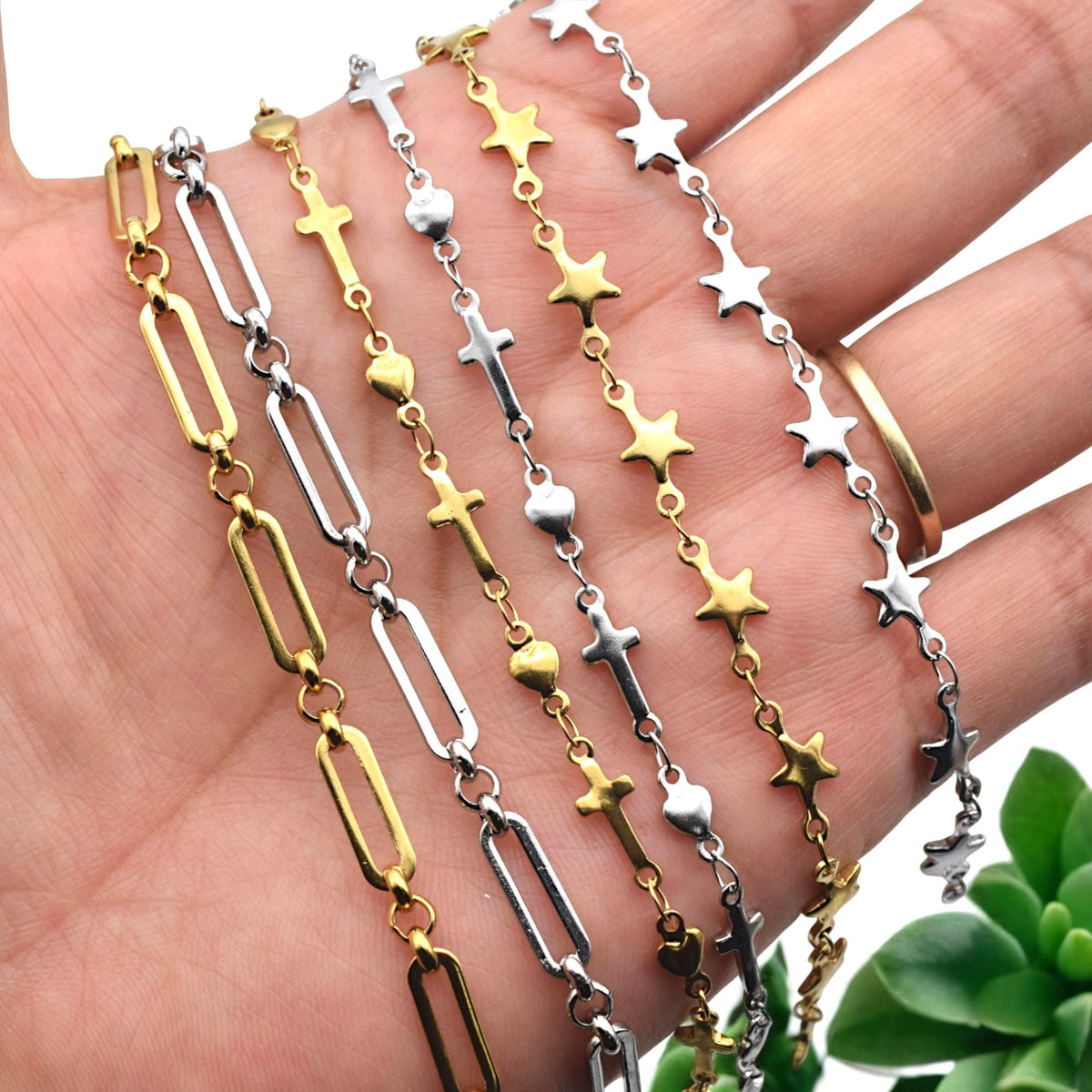 Layered stainless steel star chain styled as necklace for boutique jewelry inspiration.