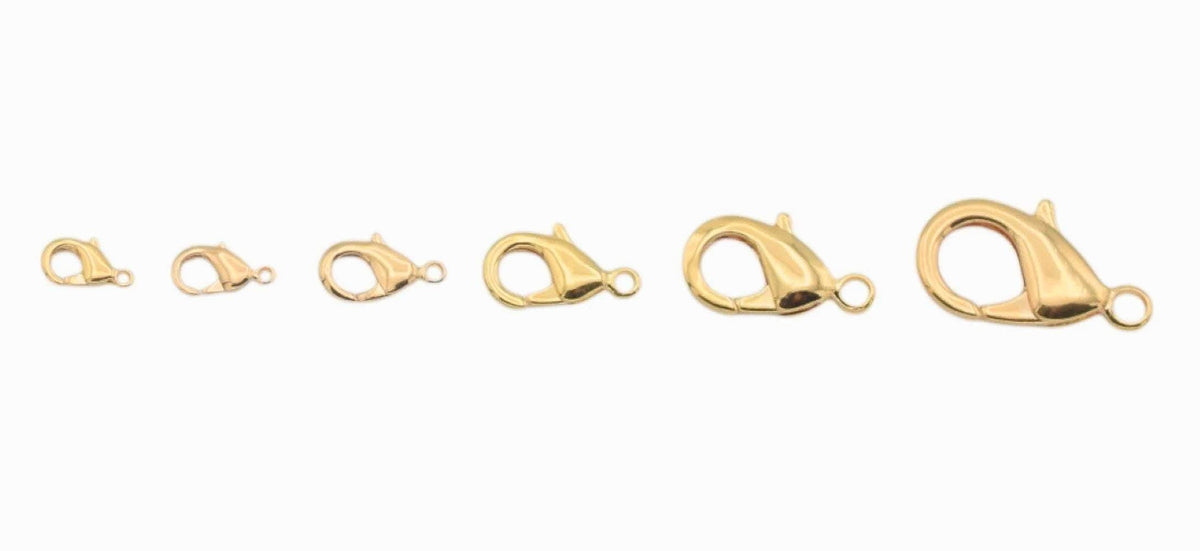 Assorted lobster clasp findings displayed on white background for craft supplies