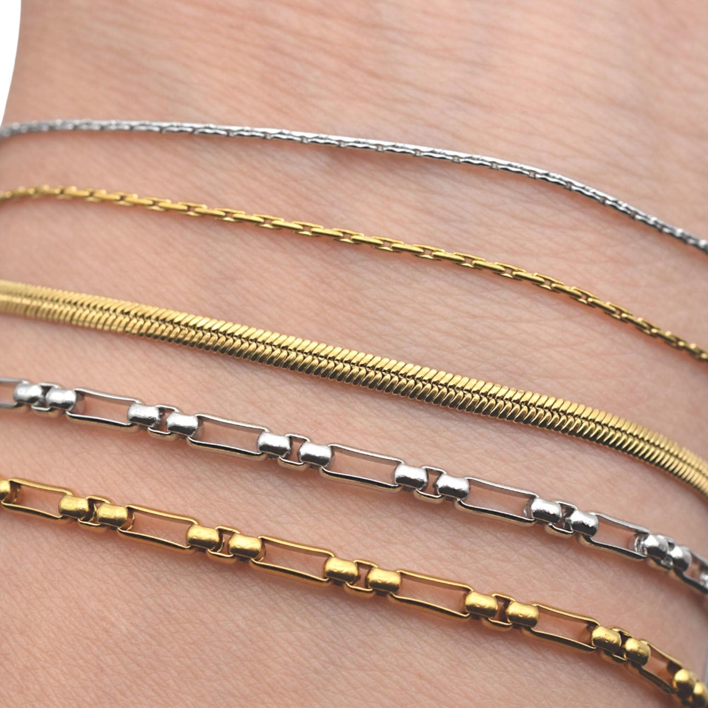 Snake chain in silver tone styled as bracelet base, perfect for jewelry makers.