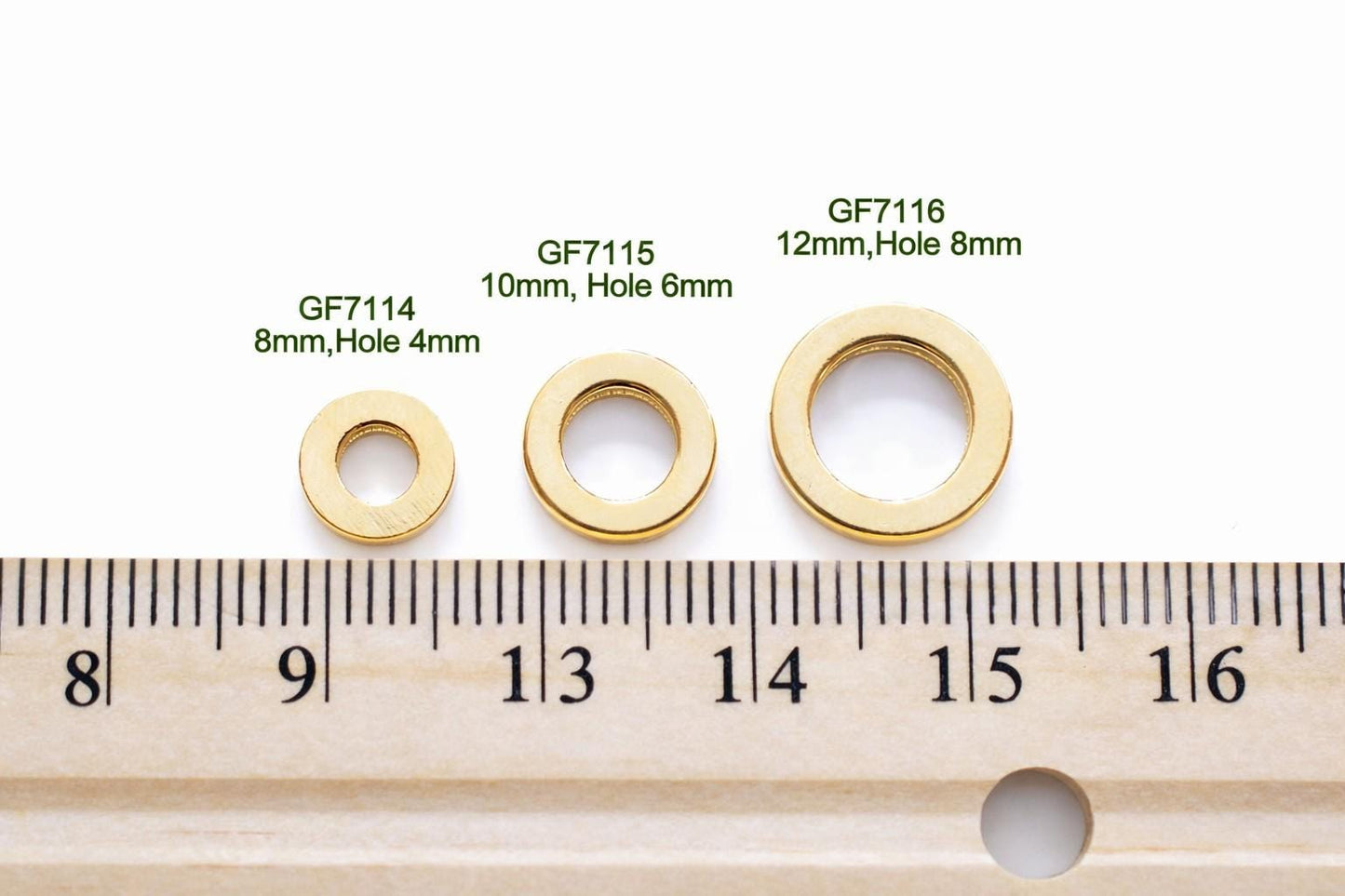 Set of square jump rings from 8mm to 35mm arranged neatly for size comparison