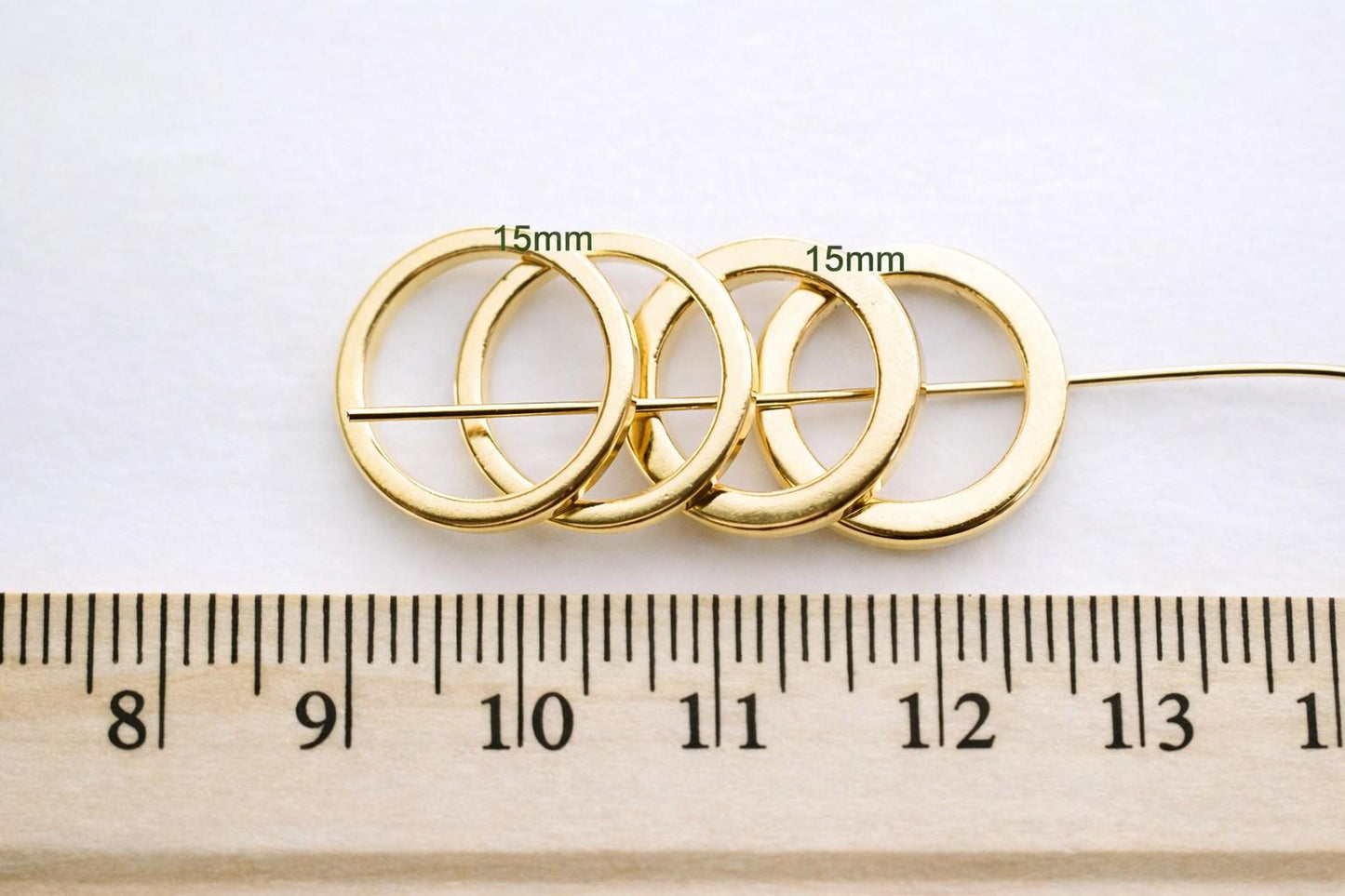 Side angle view of square jump ring showing thickness and clean edges