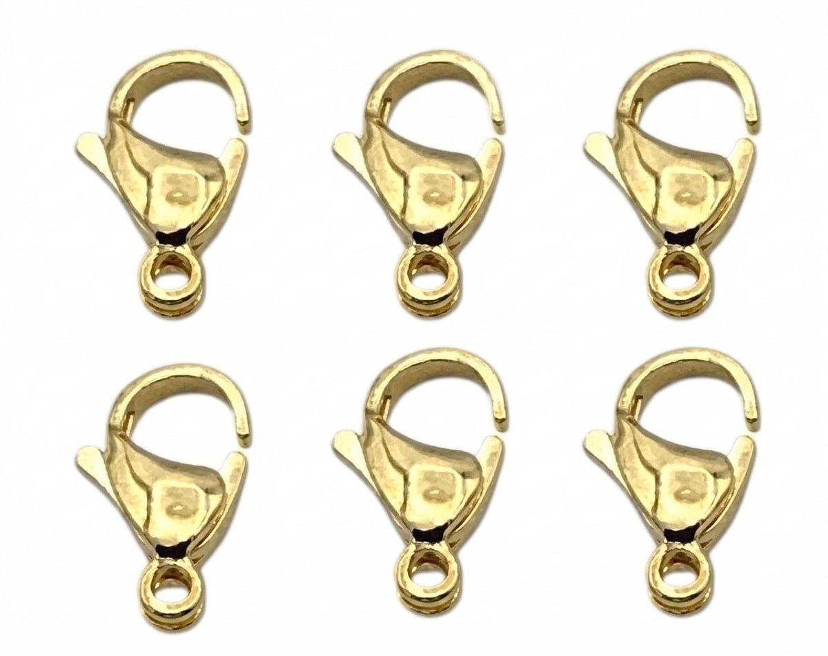 6 pieces of a gold-colored lobster clasp