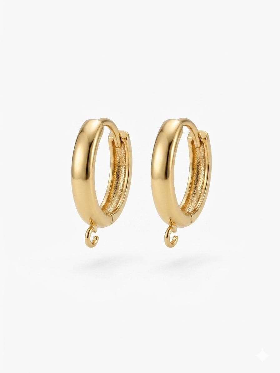 Small, thin gold-filled huggie hoops perfect for subtle everyday jewelry or as a base for lightweight charms.