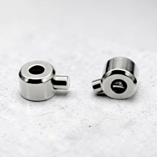 Silver stainless steel bracelet crimp end clasps for cord, chain, and beaded jewelry designs.