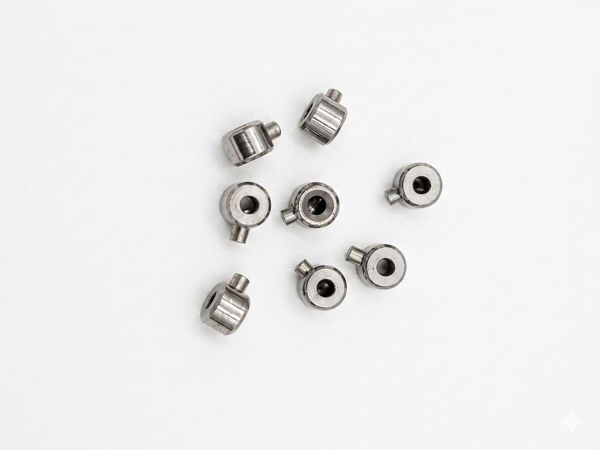Small round stainless steel crimp end connectors for jewelry repair and DIY bracelet making.