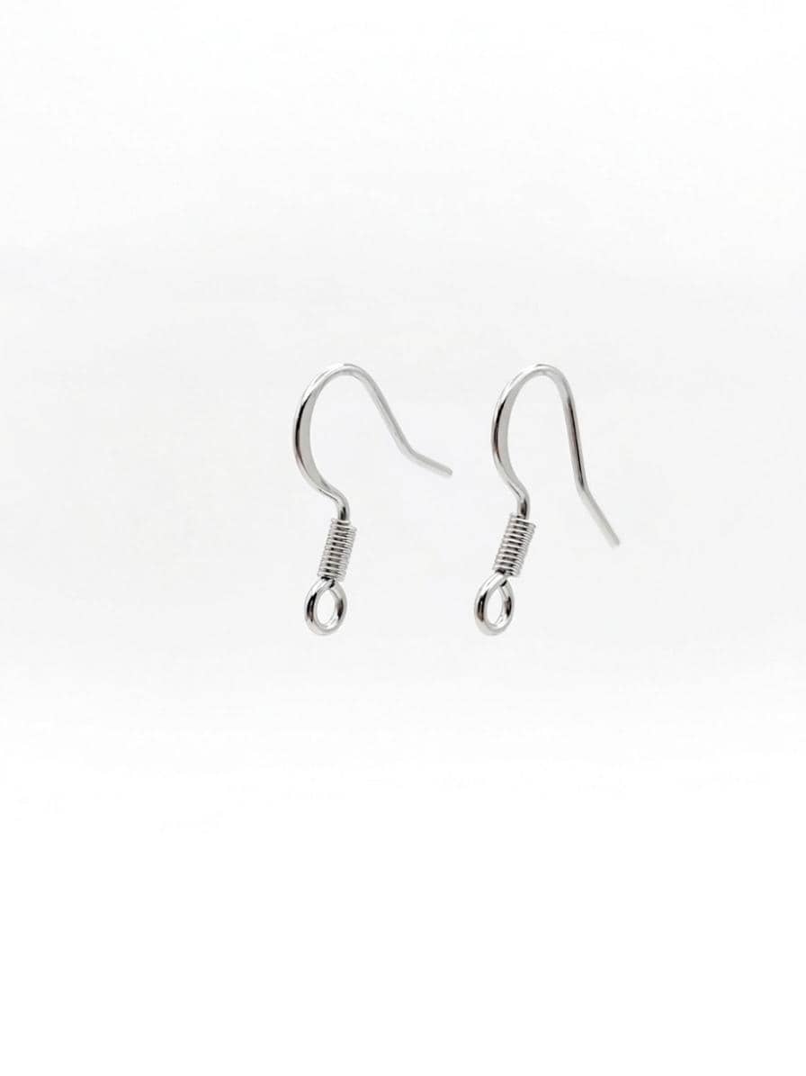 A group of hypoallergenic silver stainless steel fish hook ear wires with decorative coils and balls, perfect for dangling bead earrings.