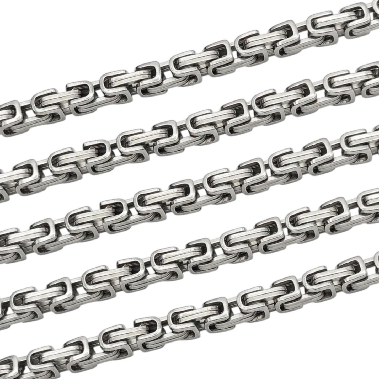 Stainless steel rectangle link chain on a white background