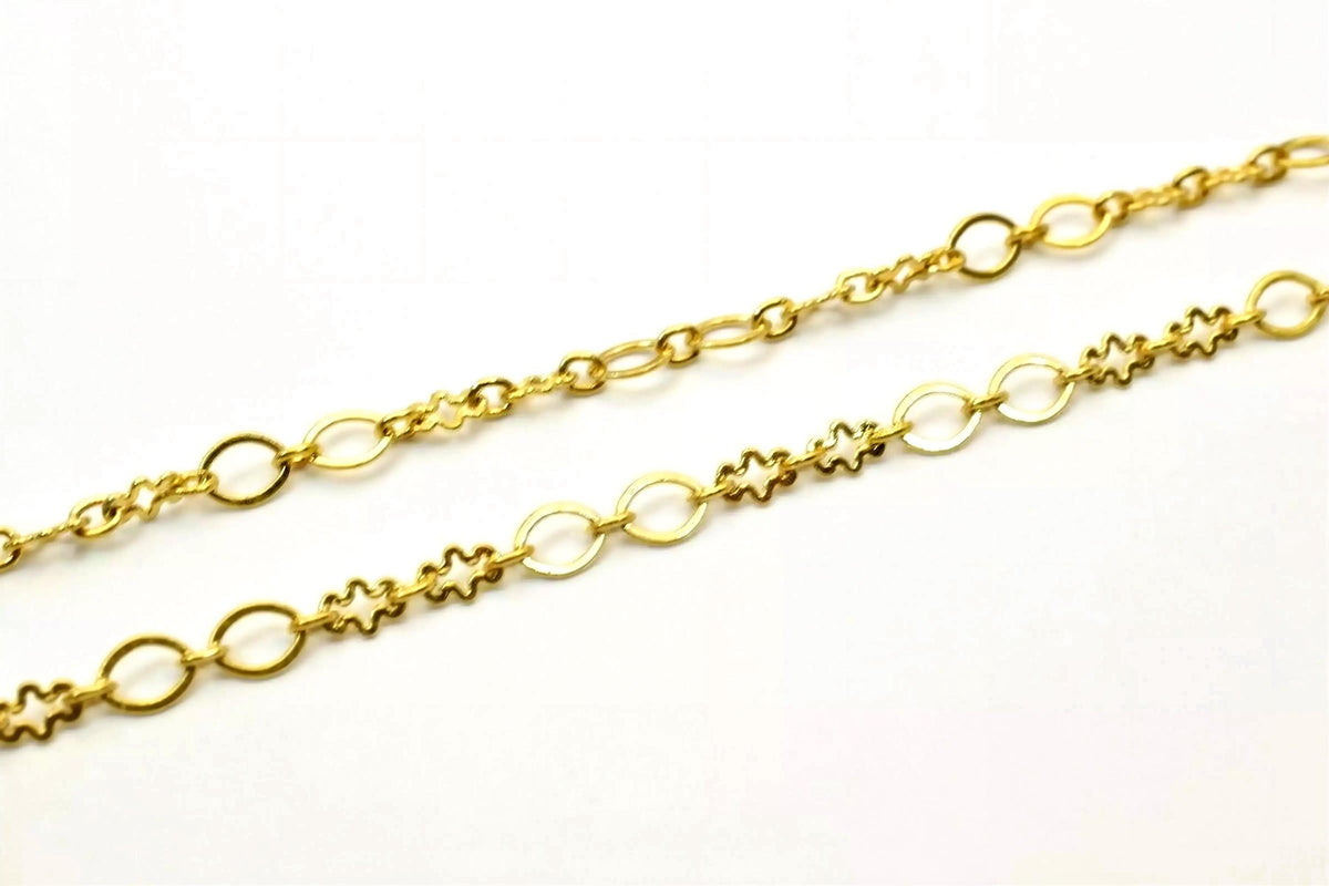 two gold-colored chain necklaces with interlocking circular links and star-shaped designs.