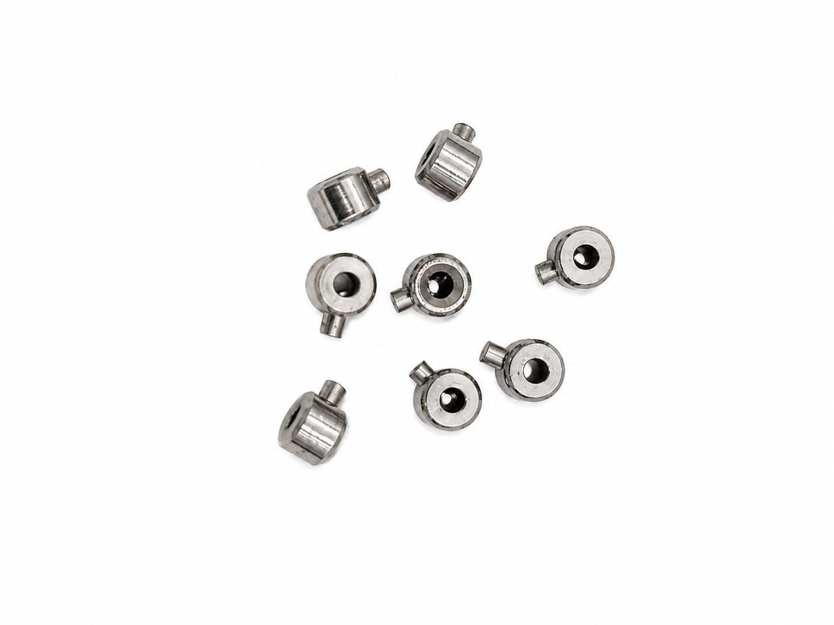 Small stainless steel cord end crimp connectors for DIY jewelry and beading projects.
