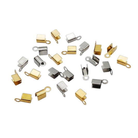 Two pairs of fold-over crimp end caps for jewelry making, shown in both sleek silver stainless steel and polished premium gold finishes, featuring open U-channels and sturdy top loops.