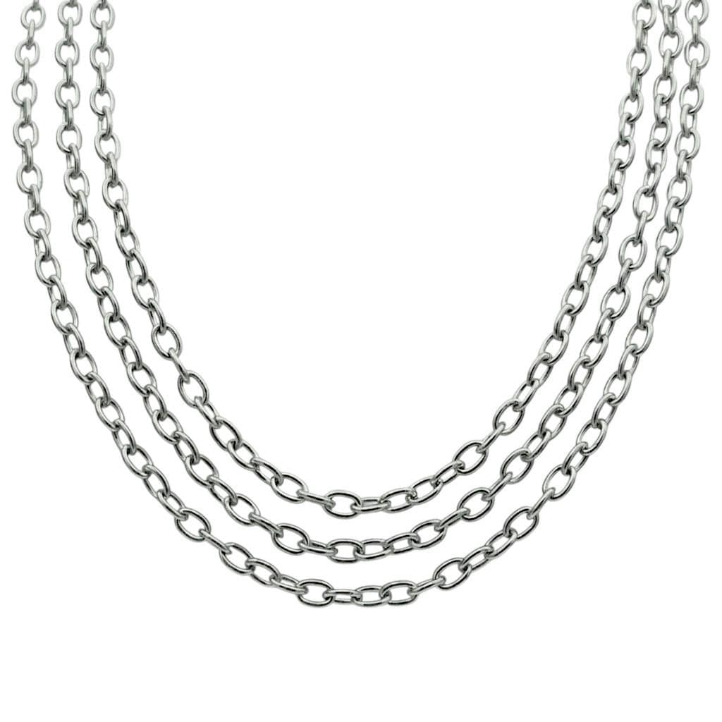Close up of three parallel rows of shiny, silver stainless steel cable link extension chain on a clean white background.