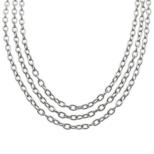 Close up of three parallel rows of shiny, silver stainless steel cable link extension chain on a clean white background.