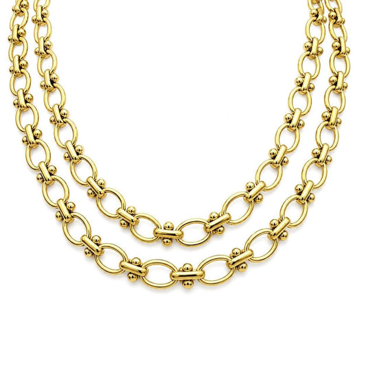 Gold stainless steel oval link chain with bar and bead details on white background.
