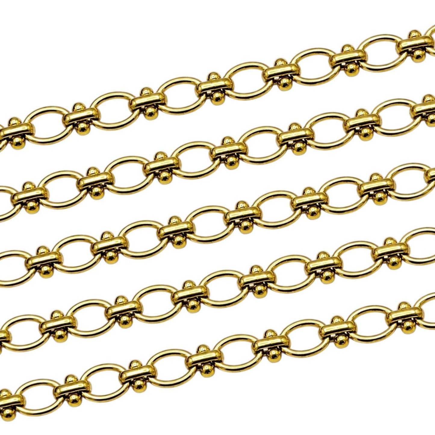 Shiny gold jewelry making chain sold by yard or 11 yard roll.