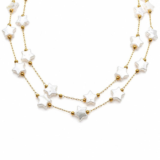 Gold stainless steel chain with white artificial star pearls displayed on a clean white background.