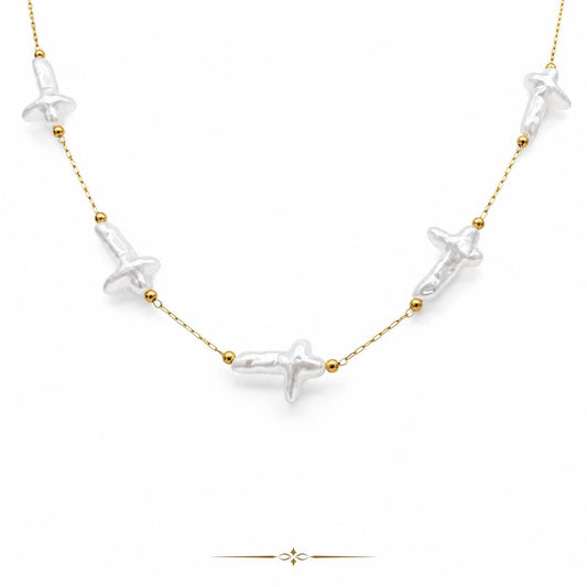 Gold stainless steel jewelry chain with white artificial cross pearl beads, sold by the yard or 10 yards for necklace, bracelet, rosary, and DIY jewelry making.