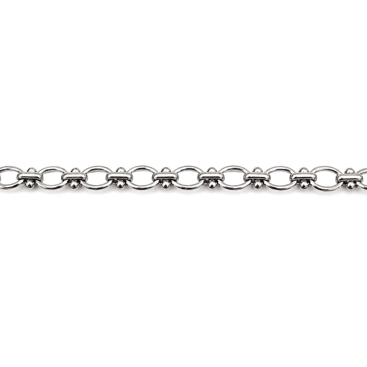 Polished silver chain by yard for jewelry making, shown in a clean product display