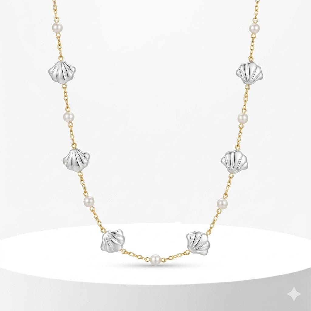 Gold stainless steel chain with artificial pearls and silver shell-shaped accents