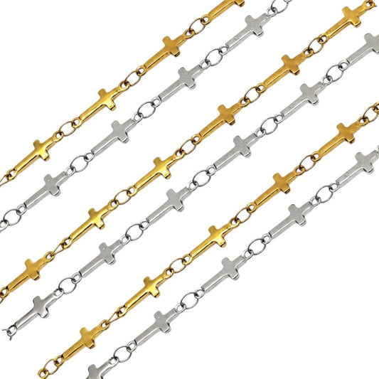 Gold and silver stainless steel cross chain displayed in curved layered rows on a white background