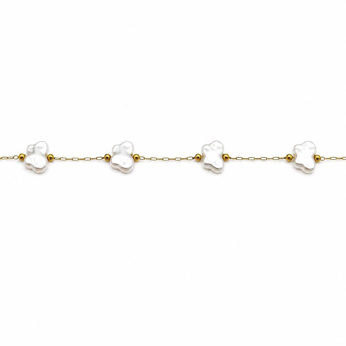 Gold chain with textured white pearl butterflies and polished spacer beads for necklace making