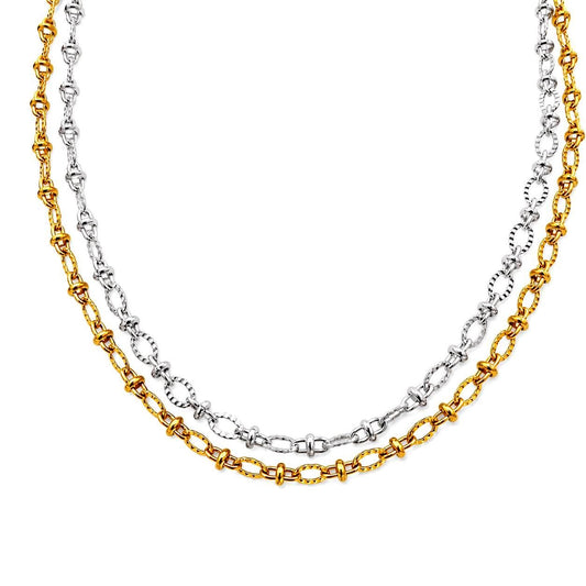 Gold and silver stainless steel oval link chains displayed in curved layered rows on a white background