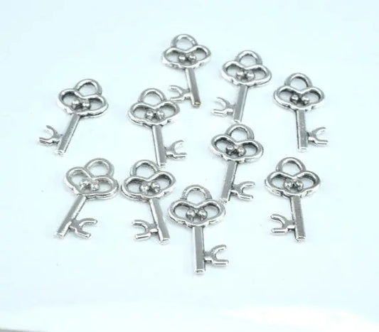 10x20mm Silver Plated Vintage Inspired Key Pendant Charm Sold by 1 pack of 25pcs, 2mm thickness, 11grams/pk - BeadsFindingDepot