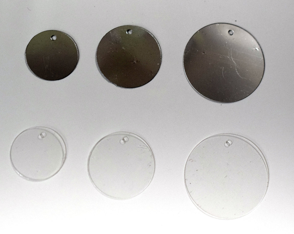 Flat Sequins Round/Loose Clear and Silver Chrome Wholesale Sequins Shimmering Sequin Apparel,Shoe Decor 15mm,20mm,25mm Hole in top .