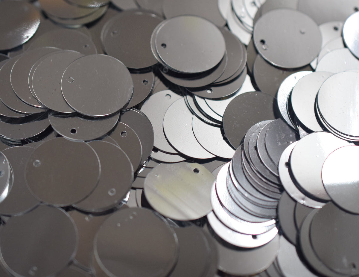 Flat Sequins Round/Loose Clear and Silver Chrome Wholesale Sequins Shimmering Sequin Apparel,Shoe Decor 15mm,20mm,25mm Hole in top .