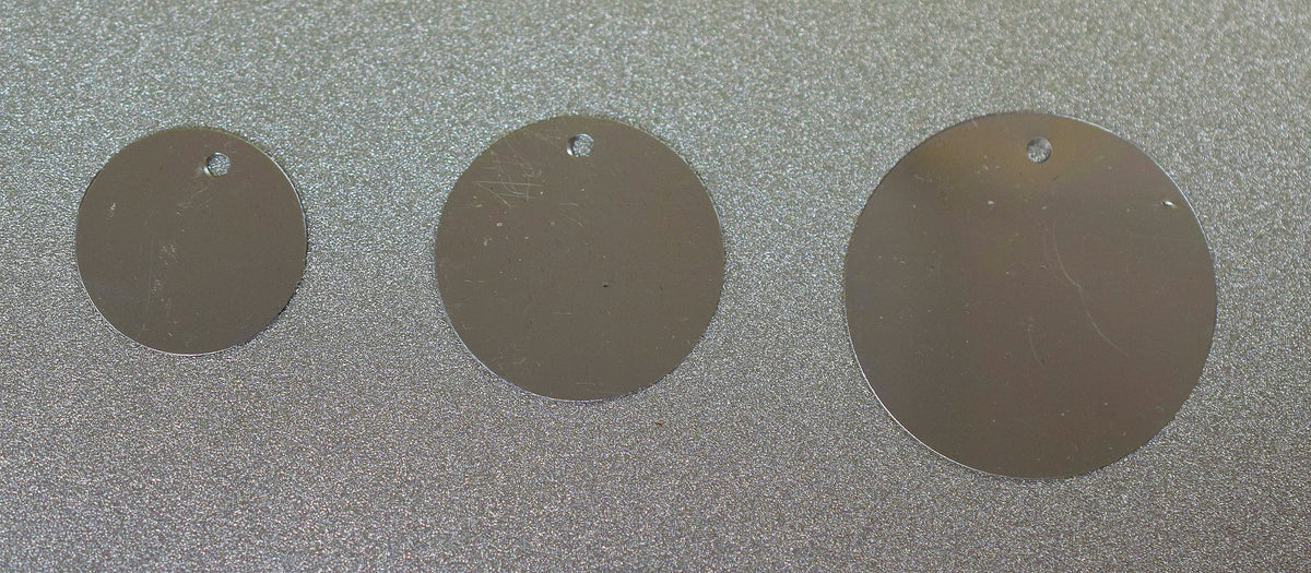 Flat Sequins Round/Loose Clear and Silver Chrome Wholesale Sequins Shimmering Sequin Apparel,Shoe Decor 15mm,20mm,25mm Hole in top .